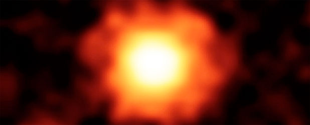 Citra inframerah halo debu raksasa yang berada di sekitar bintang HR 8799. kredit : NASA/Spitzer
