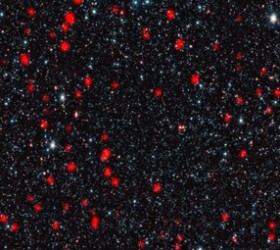 Pembentukan bintang di galaksi-galaksi jauh. kredit : ESO, APEX (MPIfR/ESO/OSO), A. Weiss et al., NASA Spitzer Science Center